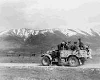 2nd NZEF Soldiers in a Morris Truck heading north to the front, Greece.