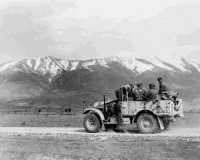 2nd NZEF Soldiers in a Morris Truck heading north to the front, Greece.