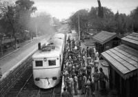Soldiers alongside the Maadi-Cairo train at Maadi station, Egypt, in 1940. Taken by an unidentified photographer