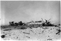 Enemy guns in Alam Nayil, Egypt, wrecked by 4th Field Regiment, New Zealand Artillery, during World War II. Photograph taken by F T Allan circa July 1942.