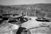 Looking along the turret of the first Tiger Tank to be knocked out by New Zealand Tanks. It was captured by the 18th New Zealand Armed Regiment during the advance to Florence. Photograph taken by George Kaye on 26th July 1944