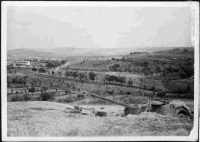 Dug-in German tank, Gothic Line, Italy.  Photographed by Jock C Montgomery. Looks out over countryside.