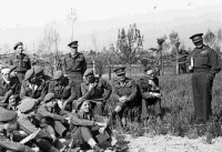 Lieutenant General Sir Bernard Cyril Freyberg VC addressing senior officers at a conference to outline the plan of battle for the crossing of the Senio River and subsequent operations.  Taken by George Kaye on 7 April 1945.