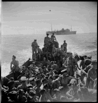 Arrival of New Zealand soldiers at Taranto, Italy.  Photograph taken by George Kaye, circa 23 October 1943. Caption on Defence Archive file print reads: 