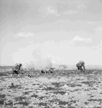 Soldiers take cover from Mortar fire in the Western Desert, Egypt.