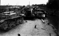 Tanks and Trucks destroyed by Artillery and Air Force, Italy.  Note on back of file reads: 22 Battalion Tanks and Trucks on roadway destroyed by Artillery and Air Force finale South of the Po.